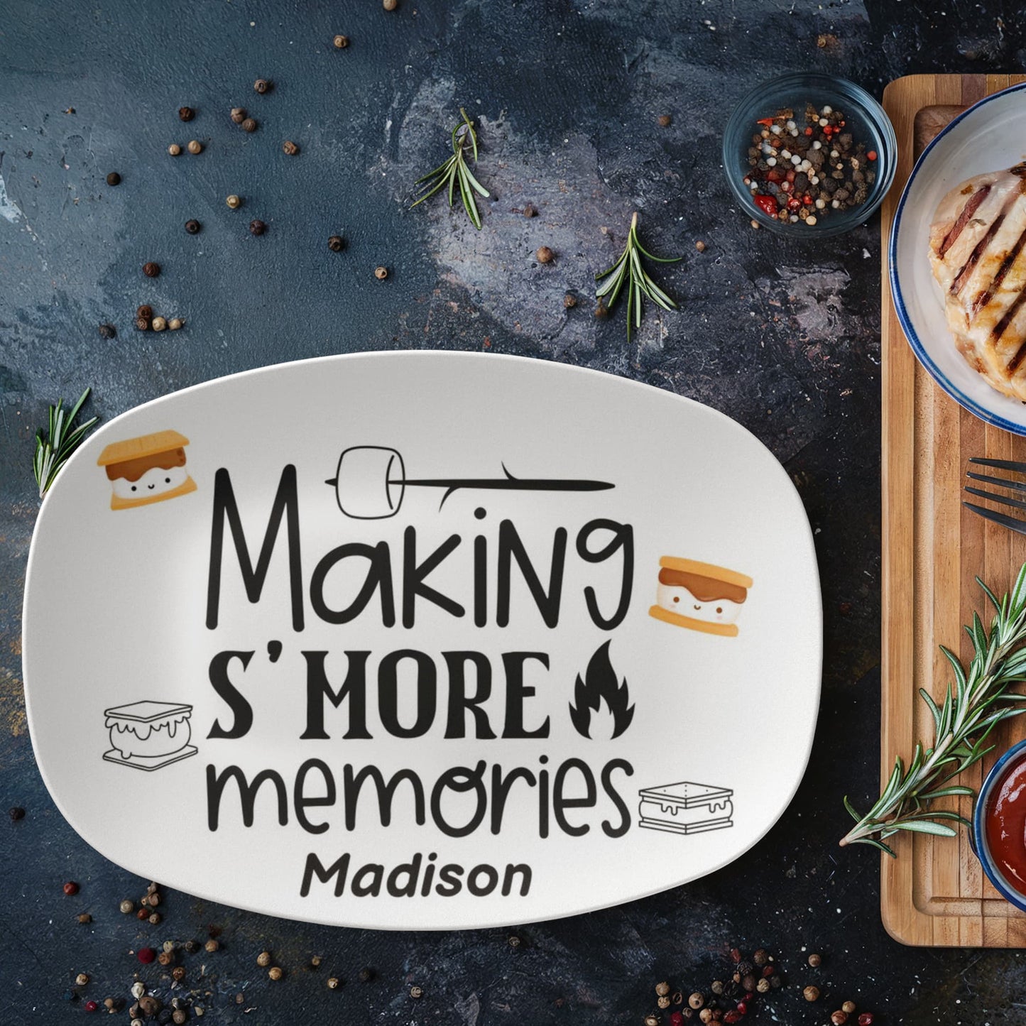 Personalized “Making S’More Memories” platter with cute s'mores graphics and the name Madison, displayed in a modern kitchen. A custom 10x14 serving dish perfect for family meals, microwave safe, dishwasher safe, and made in the USA.