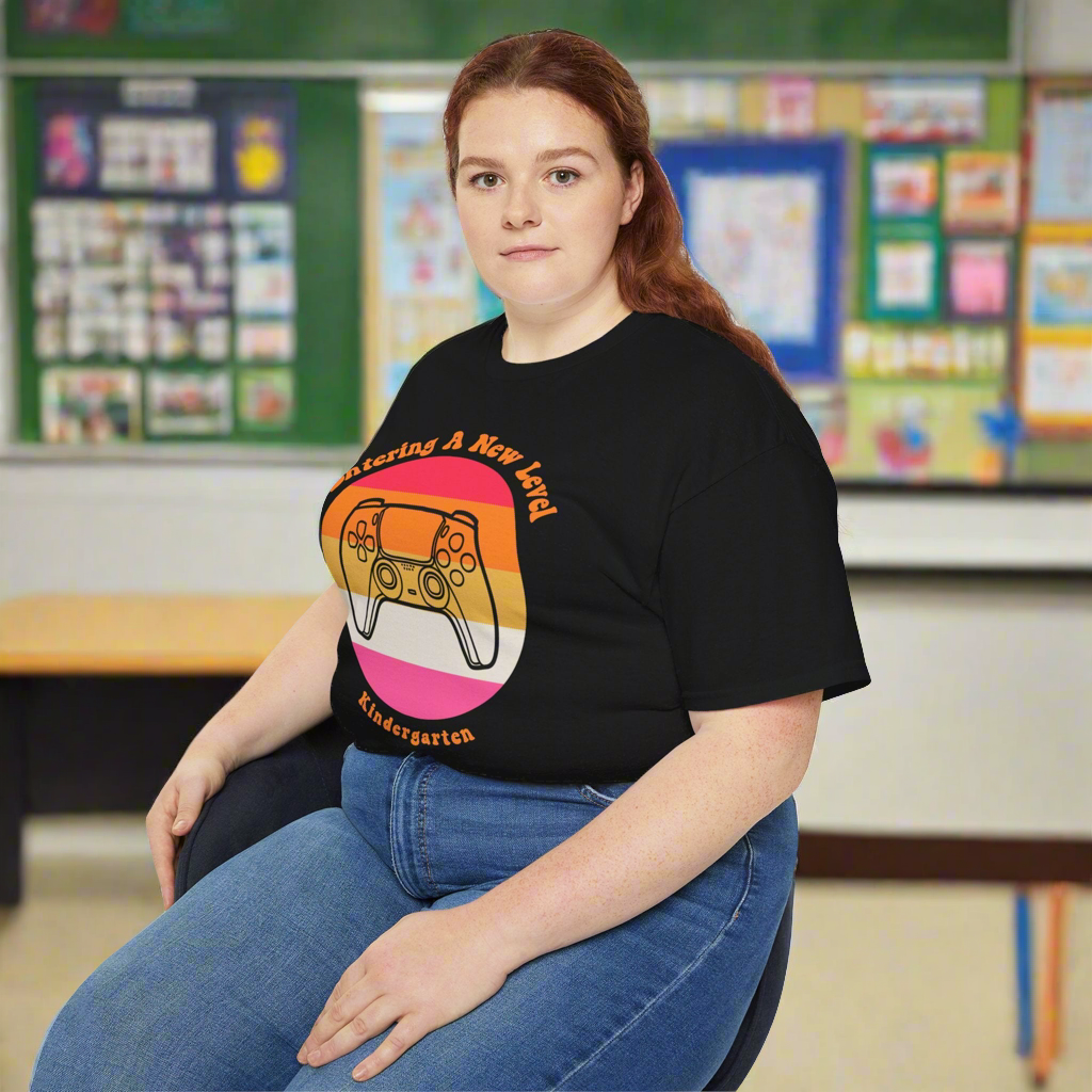 Teacher wearing Entering Kindergarten t-shirt – back to school shirt for educators