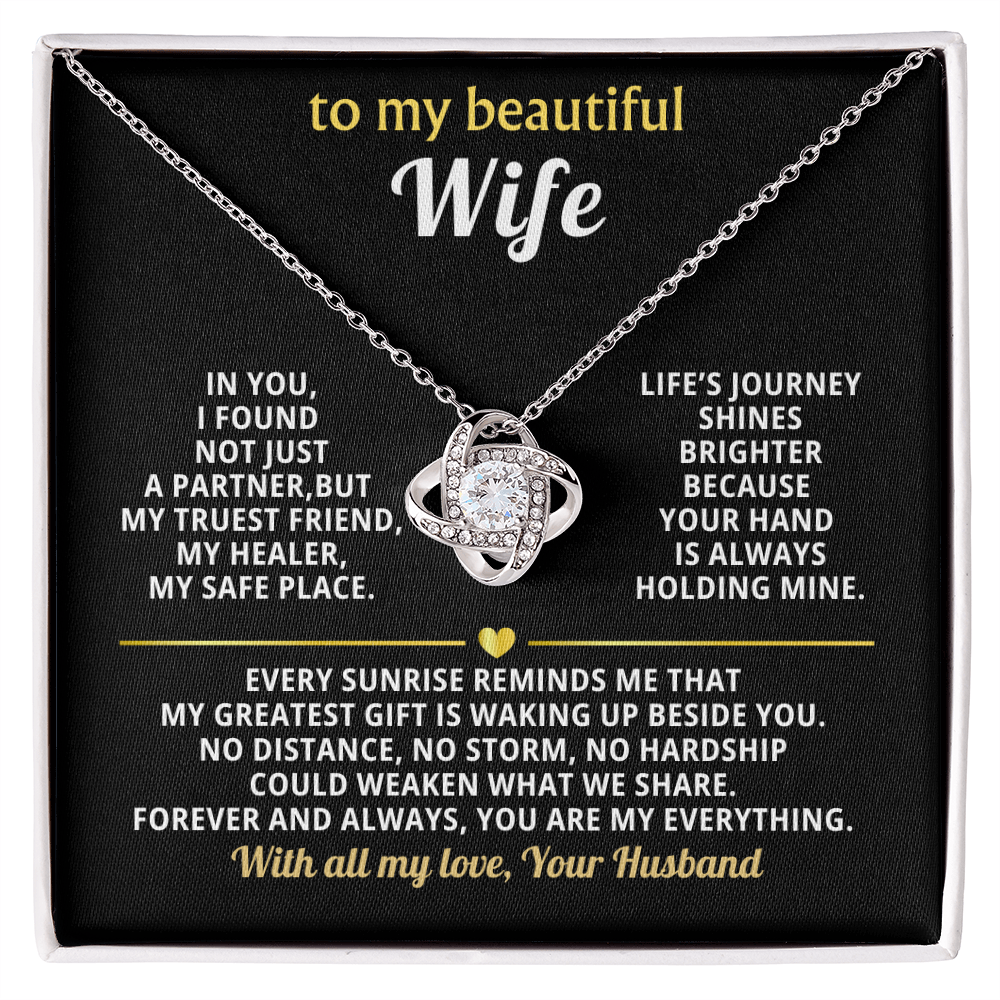 "Elegant love knot necklace with cubic zirconia crystals in premium gold setting - perfect anniversary gift for wife with romantic message card"