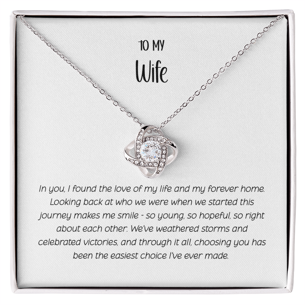 Love Knot necklace with interlocking design and sparkling CZ crystals in white gift box labeled "To My Wife" with romantic message about eternal love and unbreakable bond - Perfect anniversary gift