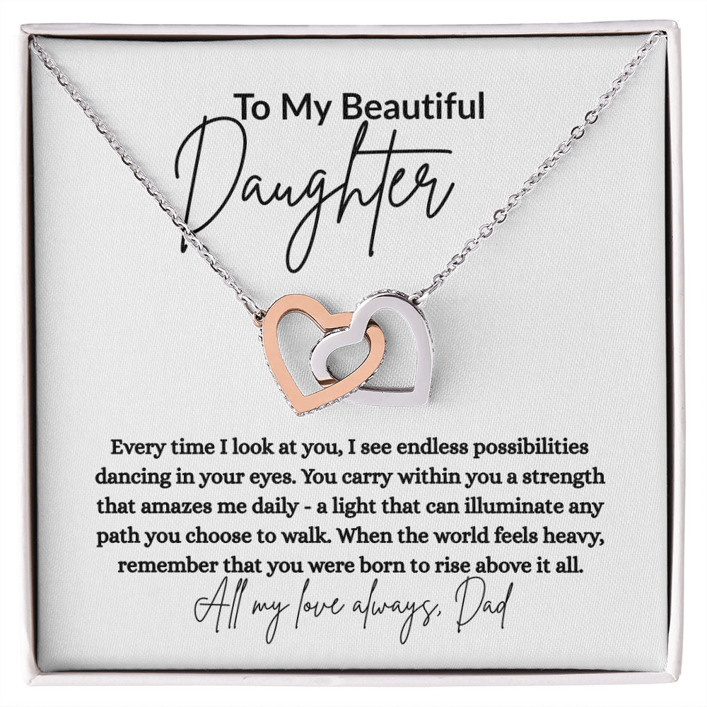 Celebrate your daughter with this Interlocking Hearts Necklace from Dad. A heartfelt gift with sparkling cubic zirconia and loving message card. Perfect for any occasion.