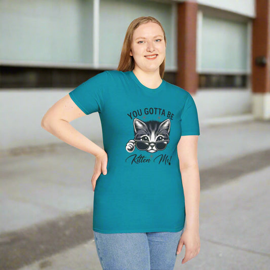 Stylish black and white illustration of a cool cat wearing sunglasses with text reading "YOU GOTTA BE Kitten Me!" on a unisex softstyle t-shirt for cat lovers