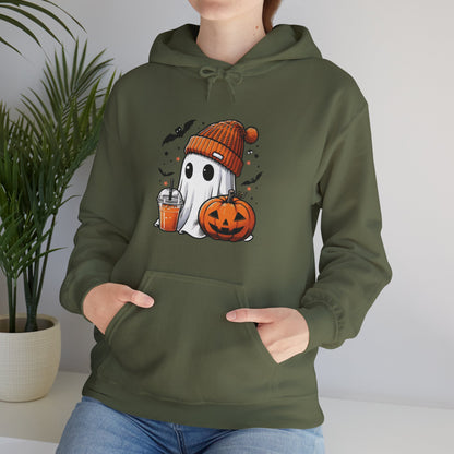 "Olive green unisex hoodie featuring adorable cartoon ghost wearing orange knit beanie and holding fall drink, sitting next to carved jack-o'-lantern pumpkin with flying bats and stars - cute cozy Halloween sweatshirt"