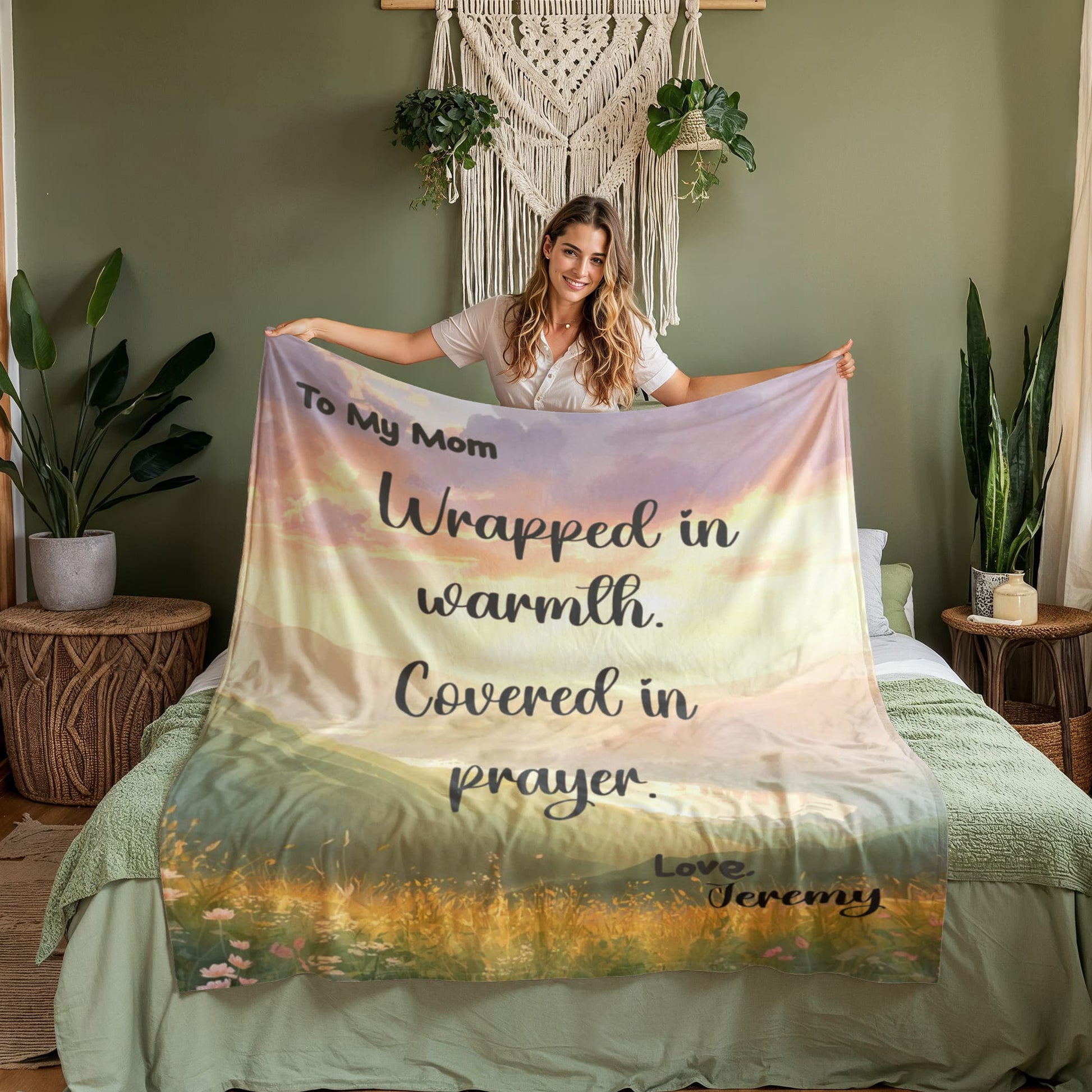 Christian blanket for mom with “Wrapped in Warmth Covered in Prayer” message, cozy coral fleece Mother’s Day gift with scenic nature design.