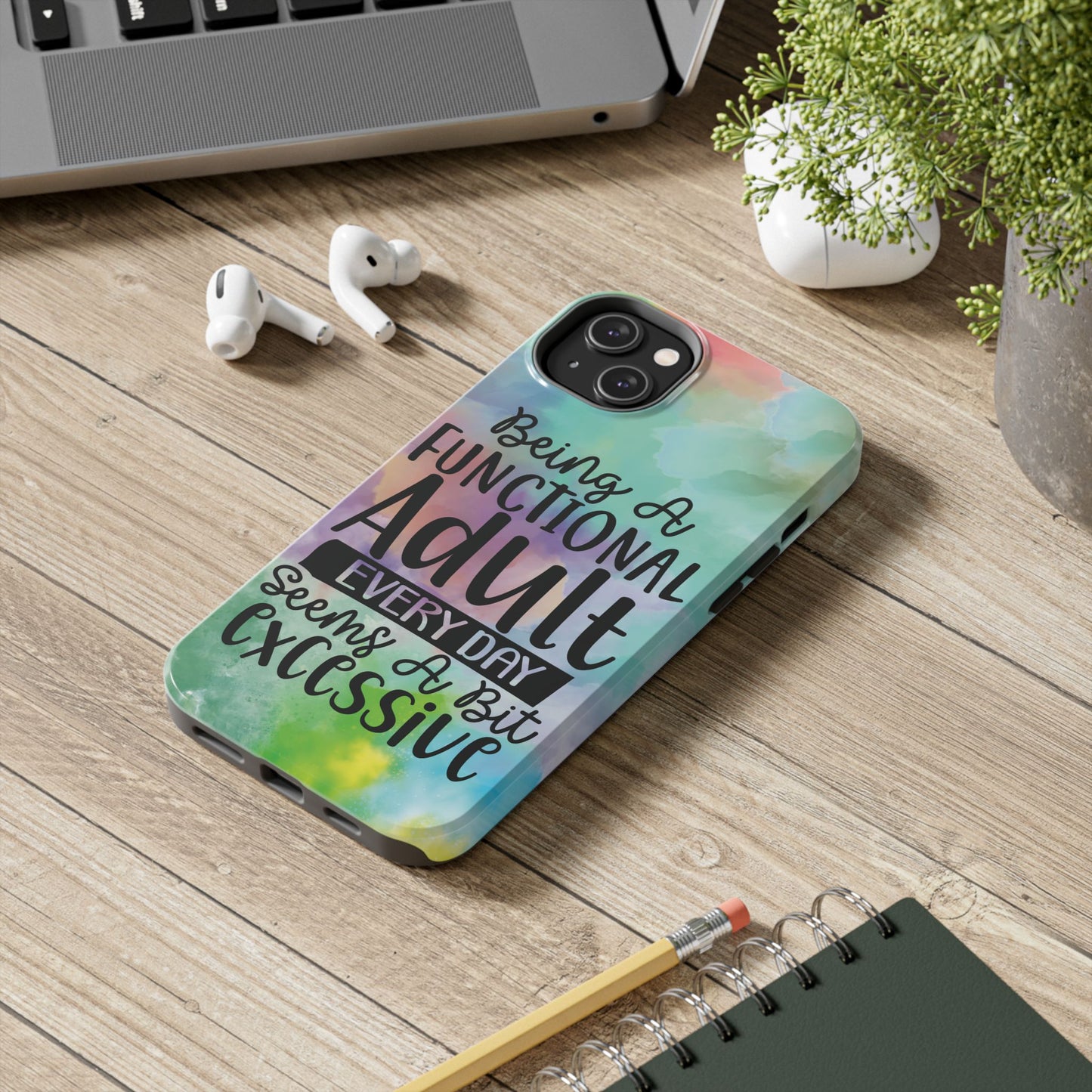 Funny adulting phone case with the quote “Being a Functional Adult Every Day Seems a Bit Excessive” on a colorful watercolor background. Durable protective iPhone cover for models 7–15.