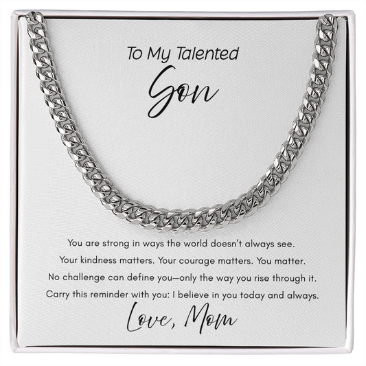 Polished silver Cuban link chain necklace displayed on white gift card with message "To My Talented Son Love Mom" featuring inspirational quote about strength and courage - adjustable men's jewelry gift