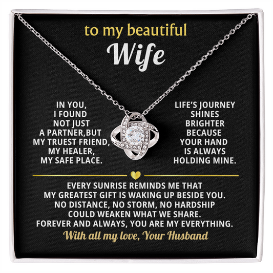 "Elegant love knot necklace with cubic zirconia crystals in premium gold setting - perfect anniversary gift for wife with romantic message card"