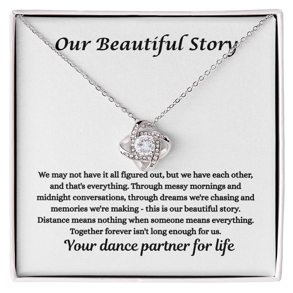 "Love Knot Necklace with sparkling cubic zirconia pendant on adjustable chain, symbolizing eternal love and unbreakable bond – perfect romantic gift for her."