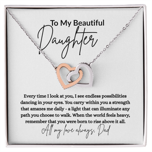 Celebrate your daughter with this Interlocking Hearts Necklace from Dad. A heartfelt gift with sparkling cubic zirconia and loving message card. Perfect for any occasion.