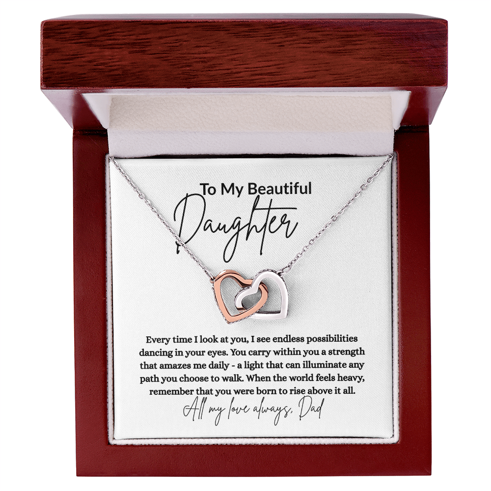 Interlocking Hearts Necklace for Daughter from Dad, featuring two cubic zirconia-studded hearts with sentimental message card saying, “To My Beautiful Daughter.”