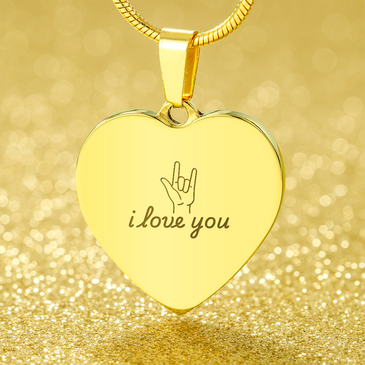 18K yellow gold engraved heart necklace pendant with i love you text and sign language hand gesture on adjustable snake chain against sparkling gold background