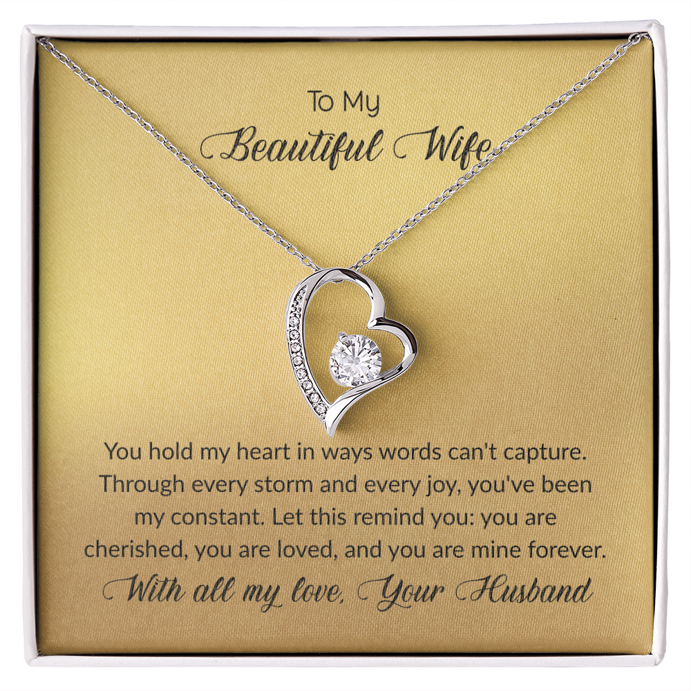 Forever Love heart necklace for wife featuring a 6.5mm cubic zirconia crystal in a polished heart pendant with white gold finish, romantic jewelry gift displayed on message card
