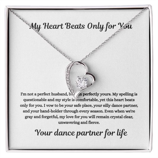 "Forever Love Necklace with heart pendant and 6.5mm cubic zirconia stone, white or yellow gold finish, displayed on romantic husband-to-wife message card."
