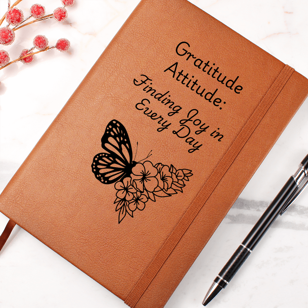 Gratitude Attitude vegan leather gratitude journal with inspirational quote, elastic closure, ribbon bookmark, and gift-ready silver wrapping for mindfulness and thankfulness journaling
