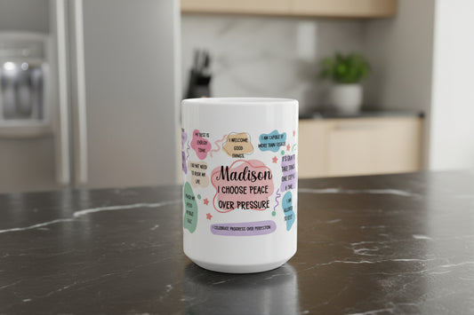 Affirmation mug with pastel colors featuring “I Choose Peace Over Pressure” and positive self care affirmations on a white ceramic coffee cup