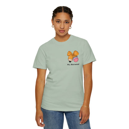 "Personalized teacher t-shirt with pencil bow and name on front – soft Comfort Colors tee in light sage green"