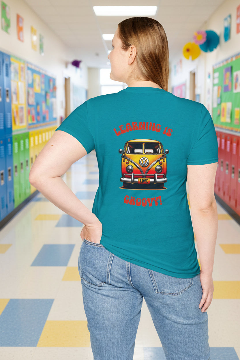 Teal unisex t-shirt with a retro VW bus graphic and "Learning is Groovy" text on the back, personalized with a custom name and pencil bow design on the front.